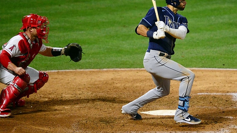 May 4, 2021; Anaheim, California, USA; Tampa Bay Rays center fielder Kevin Kiermaier (39) hits a two run RBI double against the Los Angeles Angels during the sixth inning at Angel Stadium. Mandatory Credit: Gary A. Vasquez-USA TODAY Sports