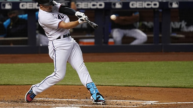May 5, 2021; Miami, Florida, USA; Miami Marlins right fielder Adam Duvall (14) connects for a three-run homerun in the 2nd inning against the Arizona Diamondbacks at loanDepot park. Mandatory Credit: Jasen Vinlove-USA TODAY Sports
