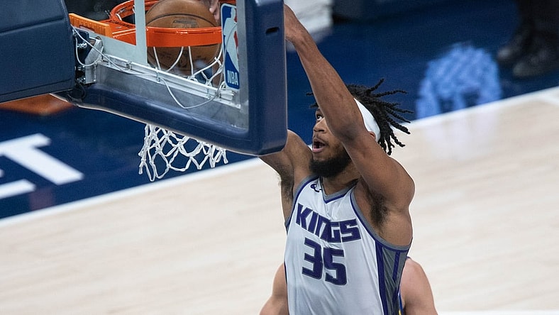 May 5, 2021; Indianapolis, Indiana, USA; Sacramento Kings forward Marvin Bagley III (35) dunks the ball in the third quarter against the Indiana Pacers at Bankers Life Fieldhouse. Mandatory Credit: Trevor Ruszkowski-USA TODAY Sports