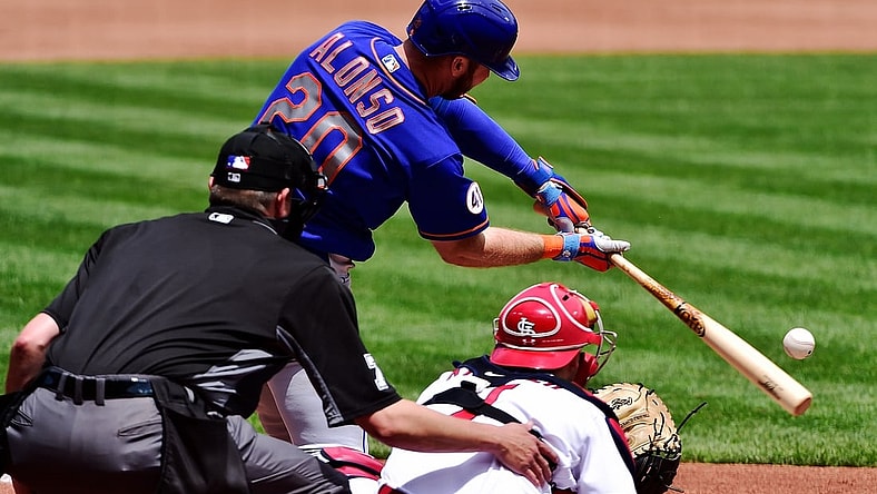 May 6, 2021; St. Louis, Missouri, USA;  New York Mets first baseman Pete Alonso (20) hits a single during the third inning against the St. Louis Cardinals at Busch Stadium. Mandatory Credit: Jeff Curry-USA TODAY Sports