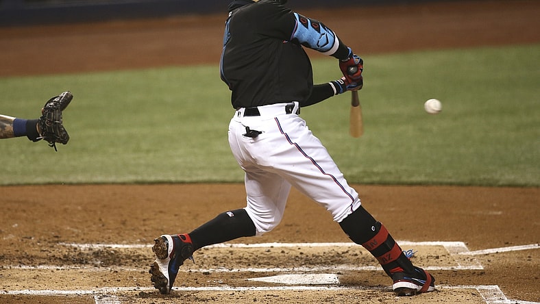 May 7, 2021; Miami, Florida, USA; Miami Marlins second baseman Isan Diaz (1) hits a grand slam home run against the Milwaukee Brewers during the third inning at loanDepot park. Mandatory Credit: Sam Navarro-USA TODAY Sports