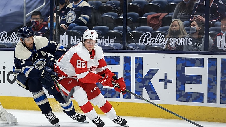 May 7, 2021; Columbus, Ohio, USA; Columbus Blue Jackets defenseman Seth Jones (3) skates as Detroit Red Wings left wing Mathias Brome (86) controls the puck in the second period at Nationwide Arena. Mandatory Credit: Aaron Doster-USA TODAY Sports