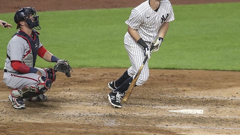 May 7, 2021; Bronx, New York, USA;  New York Yankees third baseman DJ LeMahieu (26) hits a game tying solo home run in the sixth inning against the Washington Nationals at Yankee Stadium. Mandatory Credit: Wendell Cruz-USA TODAY Sports
