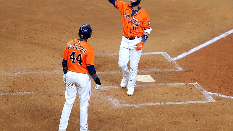 May 7, 2021; Houston, Texas, USA; Houston Astros first baseman Yuli Gurriel (10) crosses home plate after hitting a two-run home run to left field against the Toronto Blue Jays during the fifth inning at Minute Maid Park. Mandatory Credit: Erik Williams-USA TODAY Sports
