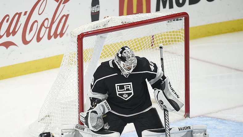 May 7, 2021; Los Angeles, California, USA; Colorado Avalanche center Tyson Jost (17) scores a goal between the legs of Los Angeles Kings goalie Calvin Petersen (40) during the second period at Staples Center. Mandatory Credit: Kelvin Kuo-USA TODAY Sports