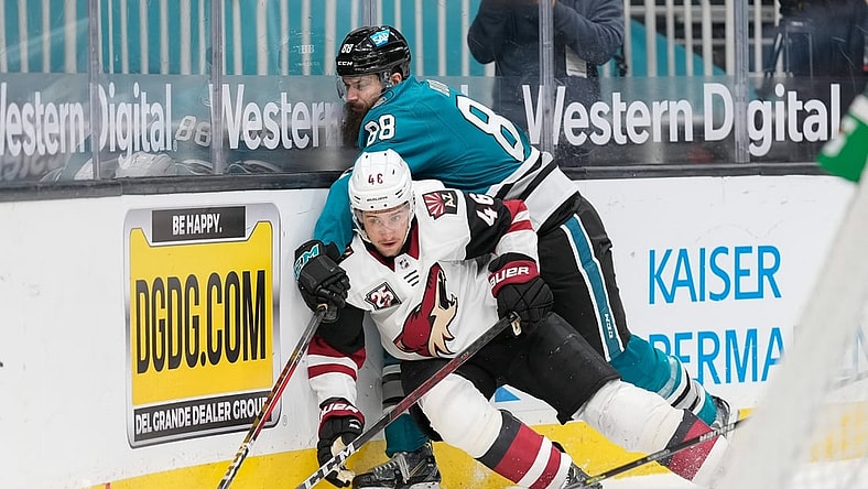 May 7, 2021; San Jose, California, USA; San Jose Sharks defenseman Brent Burns (88) collides into Arizona Coyotes defenseman Ilya Lyubushkin (46) during the third period at SAP Center at San Jose. Mandatory Credit: Stan Szeto-USA TODAY Sports