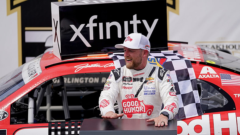 May 8, 2021; Darlington, SC, USA; NASCAR Xfinity Series driver Justin Allgaier celebrates after winning the Steakhouse Elite 200 at Darlington Raceway. Mandatory Credit: Jasen Vinlove-USA TODAY Sports