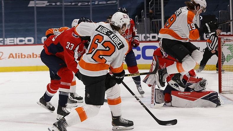 May 8, 2021; Washington, District of Columbia, USA; Philadelphia Flyers center Nolan Patrick (19) screens Washington Capitals goaltender Craig Anderson (31) on a shot by Flyers right wing Nicolas Aube-Kubel (62) in the first period at Capital One Arena. Mandatory Credit: Geoff Burke-USA TODAY Sports