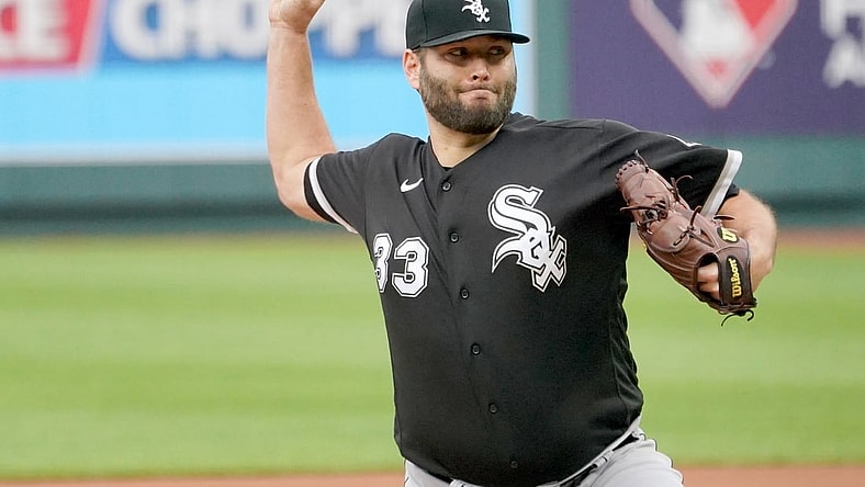 May 8, 2021; Kansas City, Missouri, USA; Chicago White Sox starting pitcher Lance Lynn (33) delivers a pitch in the first inning against the Kansas City Royals at Kauffman Stadium. Mandatory Credit: Denny Medley-USA TODAY Sports