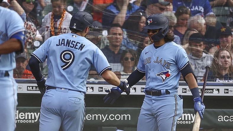 May 8, 2021; Houston, Texas, USA; Toronto Blue Jays catcher Danny Jansen (9) celebrates with shortstop Bo Bichette (11) after hitting a home run against the Houston Astros during the third inning at Minute Maid Park. Mandatory Credit: Troy Taormina-USA TODAY Sports