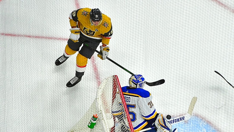 May 8, 2021; Las Vegas, Nevada, USA; St. Louis Blues goaltender Ville Husso (35) makes a first period save against Vegas Golden Knights right wing Reilly Smith (19) at T-Mobile Arena. Mandatory Credit: Stephen R. Sylvanie-USA TODAY Sports