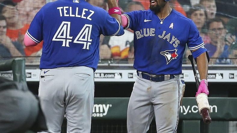 May 9, 2021; Houston, Texas, USA; Toronto Blue Jays first baseman Rowdy Tellez (44) celebrates with second baseman Marcus Semien (R) after hitting a home run during the fifth inning against the Houston Astros at Minute Maid Park. Mandatory Credit: Troy Taormina-USA TODAY Sports