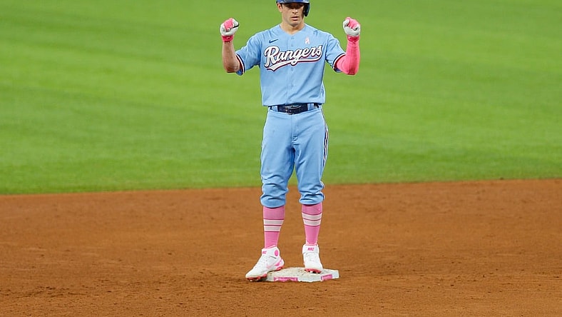 May 9, 2021; Arlington, Texas, USA; Texas Rangers second baseman Nick Solak (15) celebrates after hitting a 2 run double during the fifth inning against the Seattle Mariners at Globe Life Field. Mandatory Credit: Andrew Dieb-USA TODAY Sports