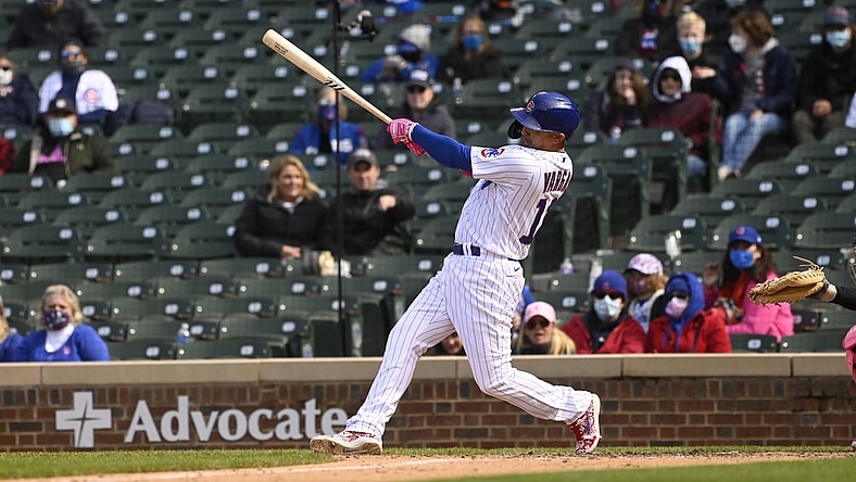 May 9, 2021; Chicago, Illinois, USA;  Chicago Cubs second baseman Ildemaro Vargas (16) hits a two rbi double during the ninth inning against the Pittsburgh Pirates at Wrigley Field. Mandatory Credit: Matt Marton-USA TODAY Sports