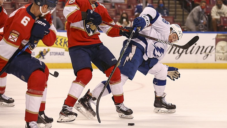 May 10, 2021; Sunrise, Florida, USA; Tampa Bay Lightning center Ross Colton (79) and Florida Panthers defenseman Markus Nutivaara (65) battle for the puck during the first period at BB&T Center. Mandatory Credit: Sam Navarro-USA TODAY Sports
