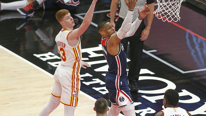 May 10, 2021; Atlanta, Georgia, USA; Washington Wizards guard Russell Westbrook (4) shoots past Atlanta Hawks guard Kevin Huerter (3) in the first quarter at State Farm Arena. Mandatory Credit: Brett Davis-USA TODAY Sports