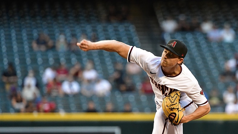 May 10, 2021; Phoenix, Arizona, USA; Arizona Diamondbacks starting pitcher Luke Weaver (24) throws in the first inning against the Miami Marlins at Chase Field. Mandatory Credit: Matt Kartozian-USA TODAY Sports