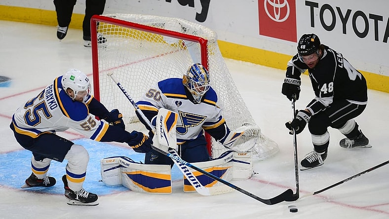 May 10, 2021; Los Angeles, California, USA; Los Angeles Kings left wing Brendan Lemieux (48) moves in for a shot as St. Louis Blues defenseman Colton Parayko (55) helps goaltender Jordan Binnington (50) defend the goal during the second period at Staples Center. Mandatory Credit: Gary A. Vasquez-USA TODAY Sports