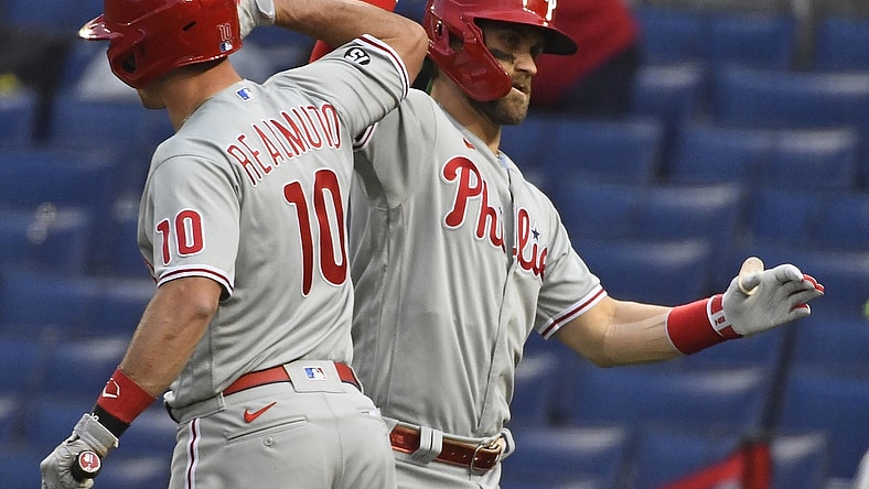 May 11, 2021; Washington, District of Columbia, USA; Philadelphia Phillies right fielder Bryce Harper (3) celebrates with catcher J.T. Realmuto (10) after hitting a solo home run against the Washington Nationals during the first inning at Nationals Park. Mandatory Credit: Brad Mills-USA TODAY Sports