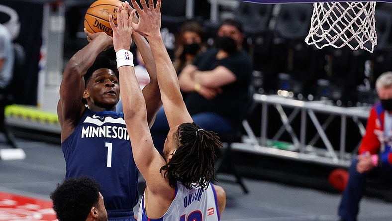 May 11, 2021; Detroit, Michigan, USA;  Minnesota Timberwolves forward Anthony Edwards (1) shoots on Detroit Pistons center Jahlil Okafor (13) in the first half at Little Caesars Arena. Mandatory Credit: Rick Osentoski-USA TODAY Sports