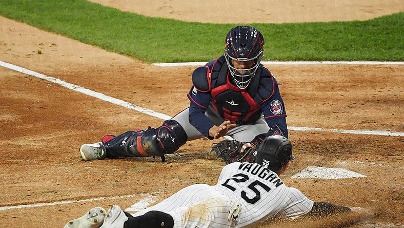 May 11, 2021; Chicago, Illinois, USA; Minnesota Twins catcher Ben Rortvedt (70) tags out Chicago White Sox first baseman Andrew Vaughn (25) at home plate in the second inning at Guaranteed Rate Field. Mandatory Credit: Quinn Harris-USA TODAY Sports