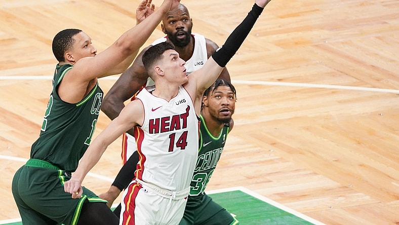 May 11, 2021; Boston, Massachusetts, USA; Miami Heat guard Tyler Herro (14) drives to the basket against the Boston Celtics in the first quarter at TD Garden. Mandatory Credit: David Butler II-USA TODAY Sports