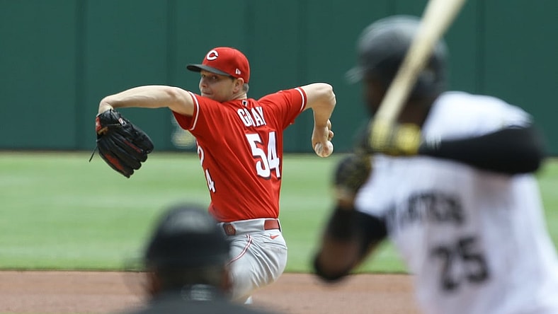 May 12, 2021; Pittsburgh, Pennsylvania, USA; Cincinnati Reds starting pitcher Sonny Gray (54) to Pittsburgh Pirates right fielder Gregory Polanco (25) during the first inning at PNC Park. Mandatory Credit: Charles LeClaire-USA TODAY Sports