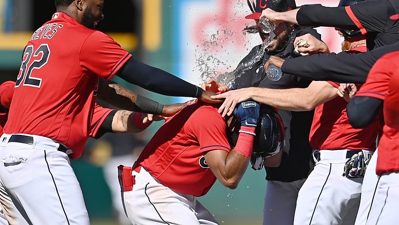 May 12, 2021; Cleveland, Ohio, USA; Cleveland Indians center fielder Amed Rosario (1) celebrates with designated hitter Franmil Reyes (32) and teammates after hitting a game winning single during the tenth inning against the Chicago Cubs at Progressive Field. Mandatory Credit: Ken Blaze-USA TODAY Sports