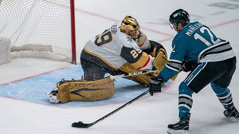 May 12, 2021; San Jose, California, USA; San Jose Sharks center Patrick Marleau (12) shoots the puck against Vegas Golden Knights goaltender Marc-Andre Fleury (29) during the first period at SAP Center at San Jose. Mandatory Credit: Neville E. Guard-USA TODAY Sports