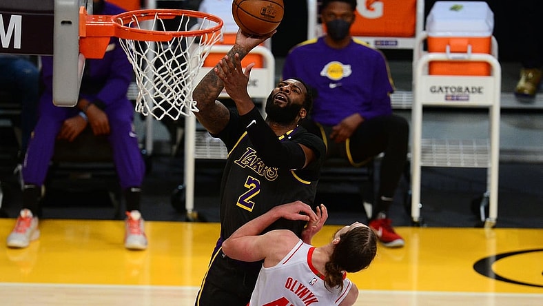 May 12, 2021; Los Angeles, California, USA; Los Angeles Lakers center Andre Drummond (2) shoots against Houston Rockets forward Kelly Olynyk (41) during the first half at Staples Center. Mandatory Credit: Gary A. Vasquez-USA TODAY Sports