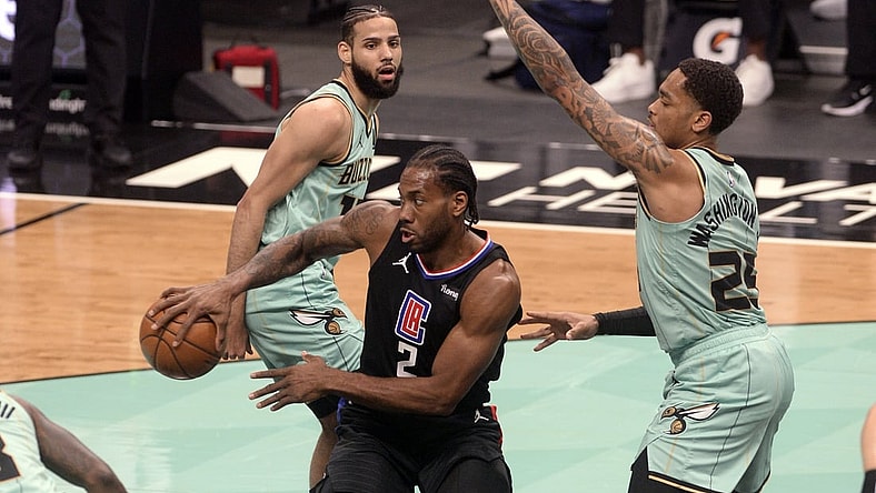 May 13, 2021; Charlotte, North Carolina, USA; Los Angeles Clippers guard forward Kawhi Leonard (2) passes the ball during the first half against the Charlotte Hornets at the Spectrum Center. Mandatory Credit: Sam Sharpe-USA TODAY Sports
