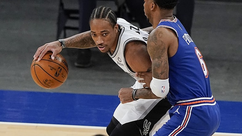 May 13, 2021; New York, New York, USA; New York Knicks' Elfrid Payton (6) defends San Antonio Spurs' DeMar DeRozan (L) during the first half at Madison Square Garden. Mandatory Credit: Frank Franklin II/POOL PHOTOS-USA TODAY Sports