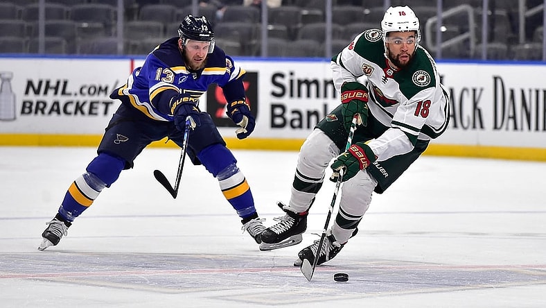 May 13, 2021; St. Louis, Missouri, USA;  Minnesota Wild left wing Jordan Greenway (18) handles the puck during the first period against the St. Louis Blues at Enterprise Center. Mandatory Credit: Jeff Curry-USA TODAY Sports