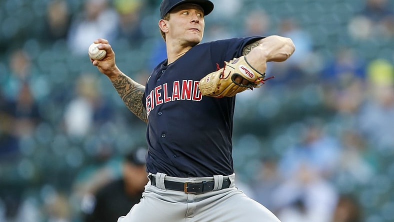May 13, 2021; Seattle, Washington, USA; Cleveland Indians starting pitcher Zach Plesac (34) throws against the Seattle Mariners during the first inning at T-Mobile Park. Mandatory Credit: Joe Nicholson-USA TODAY Sports