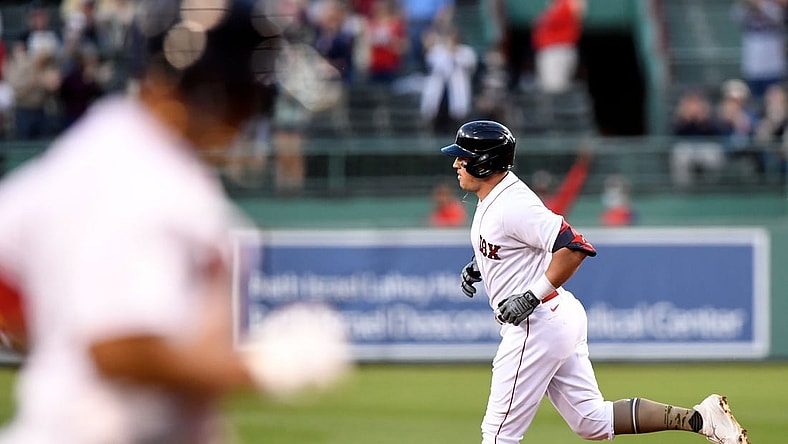 May 14, 2021; Boston, Massachusetts, USA; Boston Red Sox right fielder Hunter Renfroe (10) runs the bases with third baseman Rafael Devers (foreground) after hitting a two-run home run against the Los Angeles Angels during the second inning at Fenway Park. Mandatory Credit: Brian Fluharty-USA TODAY Sports