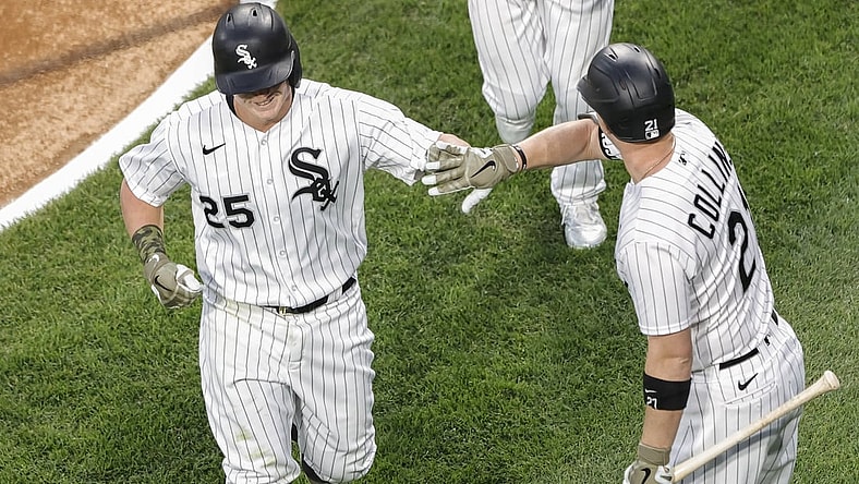 May 14, 2021; Chicago, Illinois, USA; Chicago White Sox first baseman Andrew Vaughn (25) celebrates with catcher Zack Collins (21) after hitting a two-run home run against the Kansas City Royals during the second inning of the second game of a doubleheader at Guaranteed Rate Field. Mandatory Credit: Kamil Krzaczynski-USA TODAY Sports