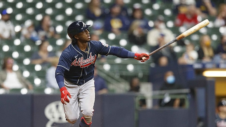 May 14, 2021; Milwaukee, Wisconsin, USA;  Atlanta Braves second baseman Ozzie Albies (1) hits a solo home run during the fifth inning against the Milwaukee Brewers at American Family Field. Mandatory Credit: Jeff Hanisch-USA TODAY Sports