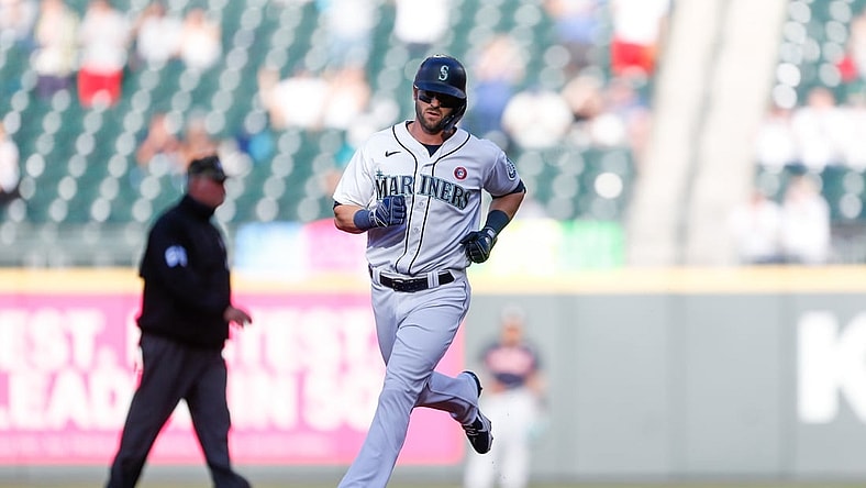 May 15, 2021; Seattle, Washington, USA; Seattle Mariners right fielder Mitch Haniger (17) trots around the bases after hitting a solo home run against the Cleveland Indians during the first inning at T-Mobile Park. Mandatory Credit: Jennifer Buchanan-USA TODAY Sports