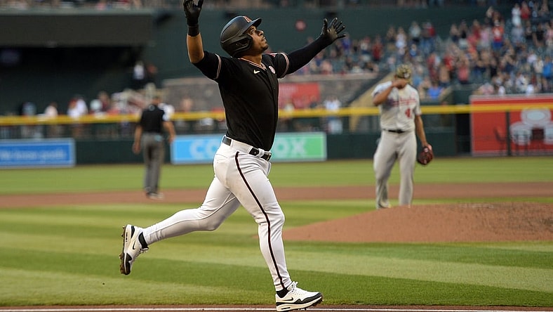 May 15, 2021; Phoenix, Arizona, USA; Arizona Diamondbacks third baseman Eduardo Escobar (5) celebrates after a three-run home run against Washington Nationals starting pitcher Joe Ross (41) during the fourth inning at Chase Field. Mandatory Credit: Joe Camporeale-USA TODAY Sports