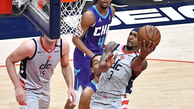 May 16, 2021; Washington, District of Columbia, USA; Washington Wizards guard Bradley Beal (3) shoots as Charlotte Hornets forward Miles Bridges (0) looks on during the second quarter at Capital One Arena. Mandatory Credit: Brad Mills-USA TODAY Sports