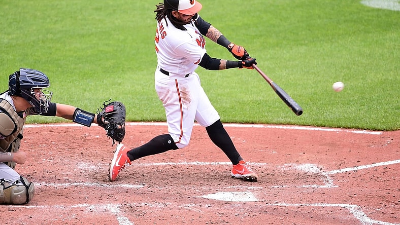 May 16, 2021; Baltimore, Maryland, USA; Baltimore Orioles shortstop Freddy Galvis (2) hits an RBI single in the third inning against the New York Yankees at Oriole Park at Camden Yards. Mandatory Credit: Evan Habeeb-USA TODAY Sports