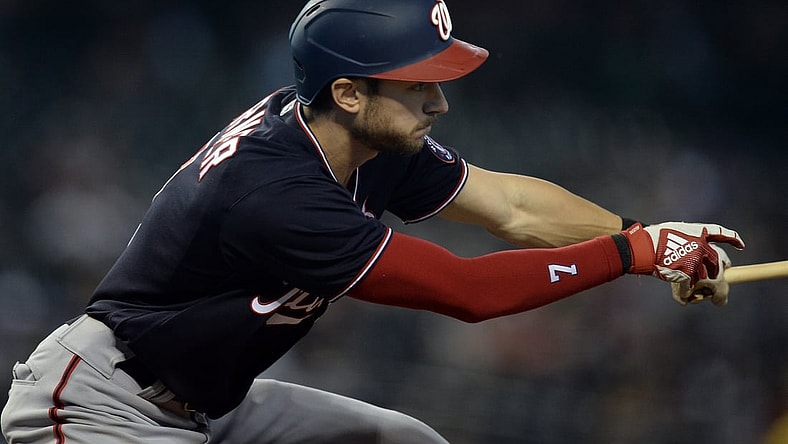 May 16, 2021; Phoenix, Arizona, USA; Washington Nationals shortstop Trea Turner (7) hits an infield single against the Arizona Diamondbacks during the third inning at Chase Field. Mandatory Credit: Joe Camporeale-USA TODAY Sports