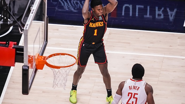 May 16, 2021; Atlanta, Georgia, USA; Atlanta Hawks forward Nathan Knight (1) passes the ball against the Houston Rockets during the first half at State Farm Arena. Mandatory Credit: Dale Zanine-USA TODAY Sports