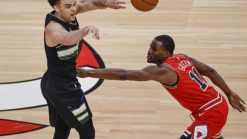 May 16, 2021; Chicago, Illinois, USA; Milwaukee Bucks guard Elijah Bryant (3) passes the ball against Chicago Bulls guard Javonte Green (11) during the first half at United Center. Mandatory Credit: Kamil Krzaczynski-USA TODAY Sports