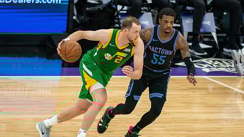 May 16, 2021; Sacramento, California, USA;  Utah Jazz guard Joe Ingles (2) drives in against Sacramento Kings guard Delon Wright (55) during the second quarter at Golden 1 Center. Mandatory Credit: Neville E. Guard-USA TODAY Sports