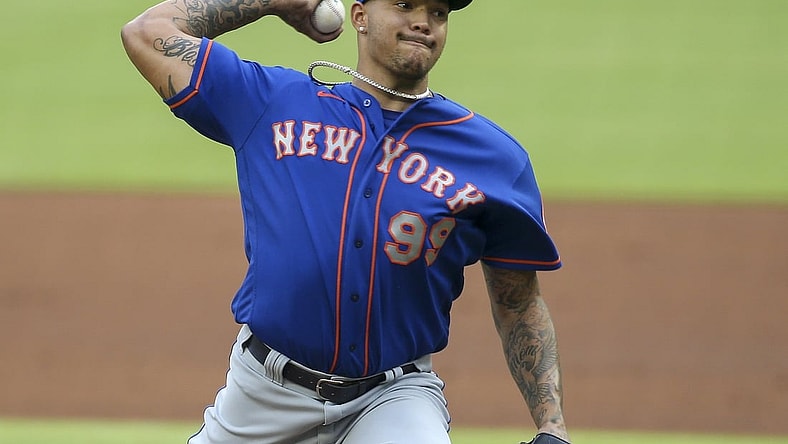 May 17, 2021; Atlanta, Georgia, USA; New York Mets starting pitcher Taijuan Walker (99) throws a pitch against the Atlanta Braves in the second inning at Truist Park. Mandatory Credit: Brett Davis-USA TODAY Sports