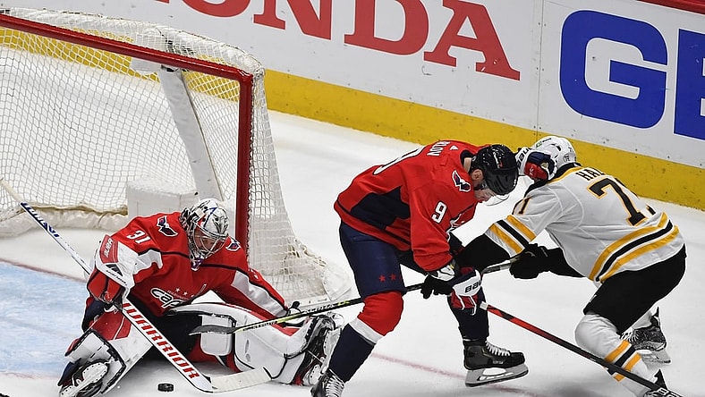 May 17, 2021; Washington, District of Columbia, USA; Washington Capitals goaltender Craig Anderson (31) makes a save against Boston Bruins left wing Taylor Hall (71) during the first period in game two of the first round of the 2021 Stanley Cup Playoffs at Capital One Arena. Mandatory Credit: Brad Mills-USA TODAY Sports