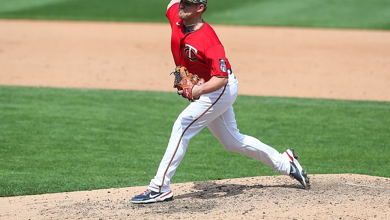May 16, 2021; Minneapolis, Minnesota, USA; Minnesota Twins relief pitcher Tyler Duffey (21) delivers a pitch against the Oakland Athletics in the fifth inning at Target Field. Mandatory Credit: David Berding-USA TODAY Sports