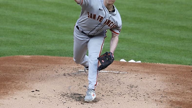 May 18, 2021; Cincinnati, Ohio, USA; San Francisco Giants starting pitcher Anthony DeSclafani (26) throws against the Cincinnati Reds during the first inning at Great American Ball Park. Mandatory Credit: David Kohl-USA TODAY Sports