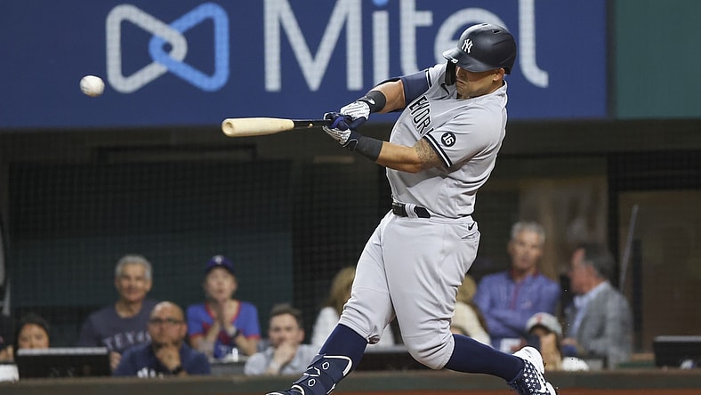 May 18, 2021; Arlington, Texas, USA; New York Yankees second baseman Rougned Odor (18) singles during the second inning against the Texas Rangers at Globe Life Field. Mandatory Credit: Kevin Jairaj-USA TODAY Sports